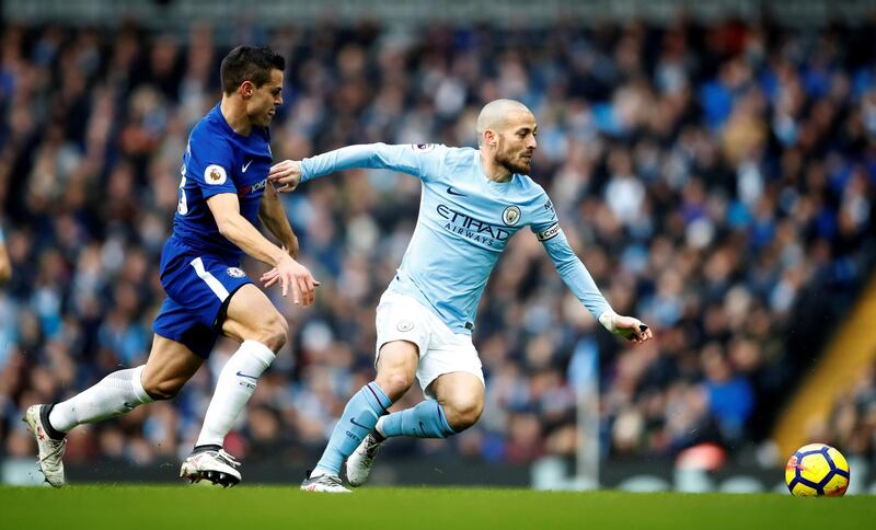 Soccer Football - Premier League - Manchester City vs Chelsea - Etihad Stadium, Manchester, Britain - March 4, 2018   Manchester City's David Silva in action with Chelsea's Cesar Azpilicueta    Action Images via Reuters/Carl Recine    EDITORIAL USE ONLY. No use with unauthorized audio, video, data, fixture lists, club/league logos or "live" services. Online in-match use limited to 75 images, no video emulation. No use in betting, games or single club/league/player publications.  Please contact your account representative for further details.