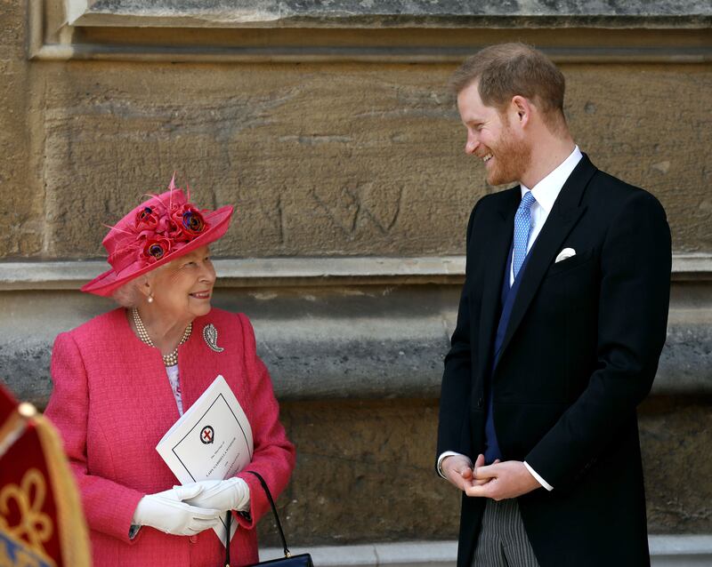 Queen Elizabeth II speaks with Prince Harry at Windsor Castle in 2019. Getty Images