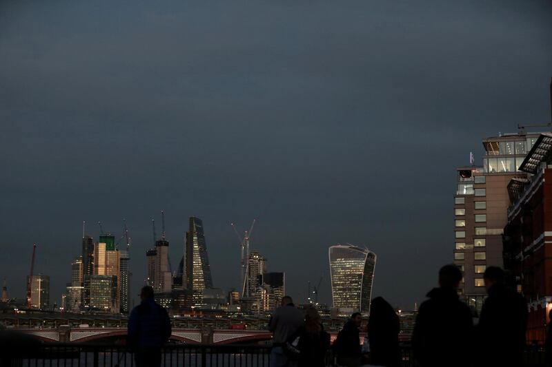 FILE PHOTO: The late winter light shines on the buildings in the City of London financial district of London, Britain November 24, 2017.  REUTERS/Simon Dawson/File Photo