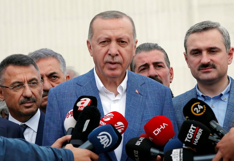 Turkish President Tayyip Erdogan talks to media after the Eid al-Fitr prayers to mark the end of the holy month of Ramadan in Istanbul, Turkey, June 4, 2019. REUTERS/Murad Sezer