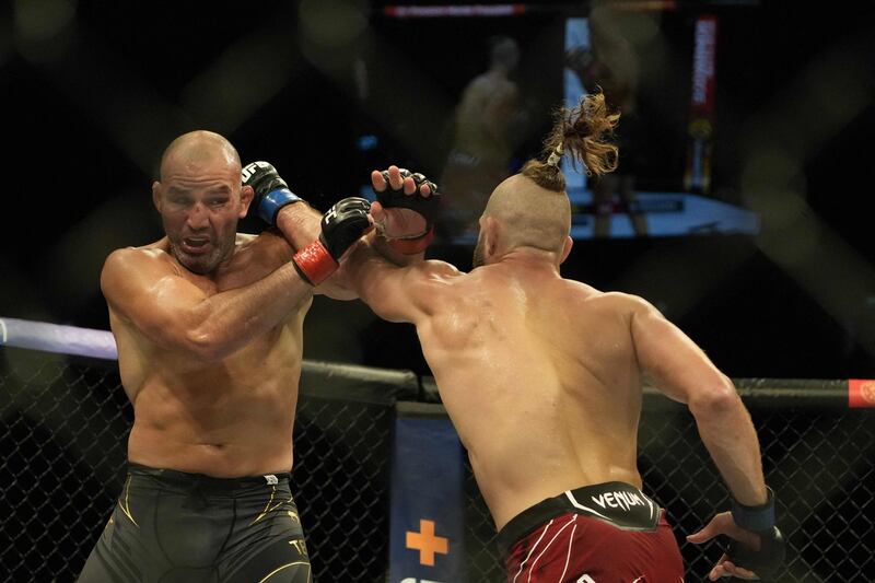 Jiri Prochazka throws a punch at Glover Teixeira during their light heavyweight title fight at UFC 275. AFP