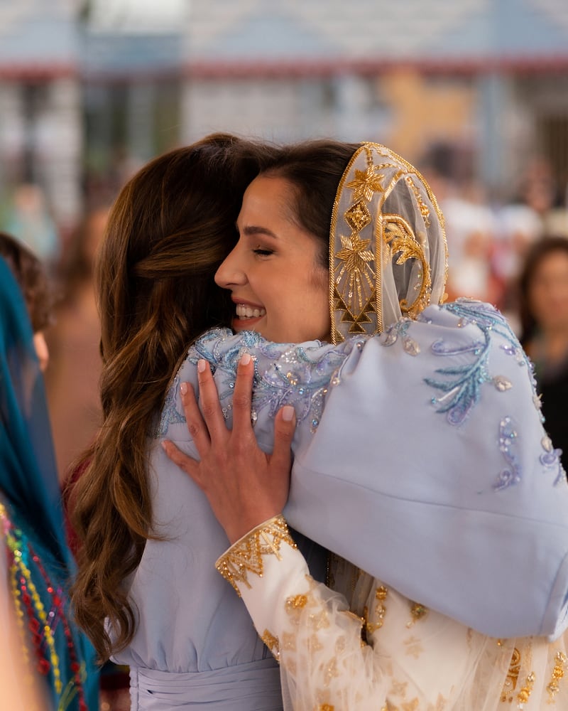 Queen Rania of Jordan embraces bride-to-be Rajwa Al Saif. Photo: Queen Rania Media Office 