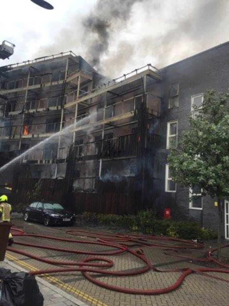 Around 100 firefighters tackled the blaze which has destroyed 20 flats. London Fire Brigade