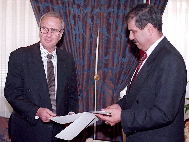 Mr Tarawneh (R) receives the credentials of Israel's new ambassador to Jordan, Oded Eran, who arrived in Amman in May. AFP