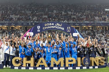 ABU DHABI, UNITED ARAB EMIRATES - APRIL 11: Al Hilal players lift the Saudi Super Cup after defeating Al Ittihad during the Saudi Super Cup Final between Al Ittihad and Al Hilal at the Mohammed Bin Zayed Stadium on April 11, 2024 in Abu Dhabi, United Arab Emirates.  (Photo by Neville Hopwood / Getty Images)