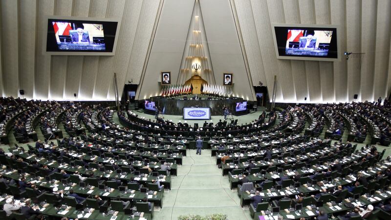 Iranian politicians attend the New Iranian parliament inauguration ceremony at the parliament in Tehran. EPA