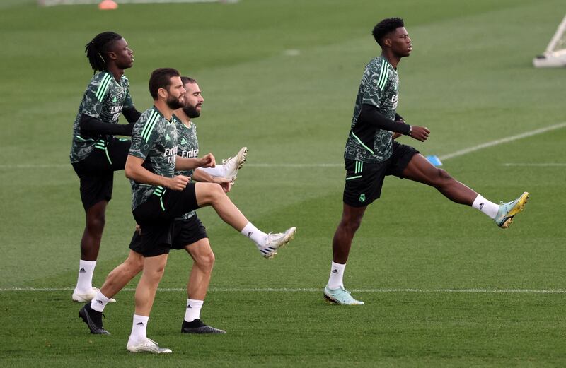 Real Madrid defender Aurelien Tchouameni, right, during training. AFP