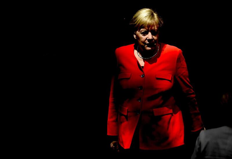 German Chancellor Angela Merkel arrives for a session of parliament in Berlin. Filip Singer/EPA