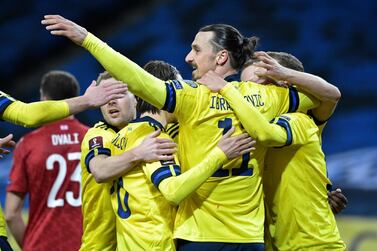 Soccer Football - World Cup Qualifiers Europe - Group B - Sweden v Georgia - Friends Arena, Stockholm, Sweden - March 25, 2021 Sweden's Zlatan Ibrahimovic celebrates after teammate Viktor Claesson scores their first goal TT News Agency via REUTERS/Janerik Henriksson THIS IMAGE HAS BEEN SUPPLIED BY A THIRD PARTY. IT IS DISTRIBUTED, EXACTLY AS RECEIVED BY REUTERS, AS A SERVICE TO CLIENTS. SWEDEN OUT. NO COMMERCIAL OR EDITORIAL SALES IN SWEDEN..
