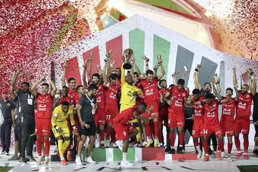 Shabab Al Ahli celebrate their President's Cup final win. Chris Whiteoak / The National