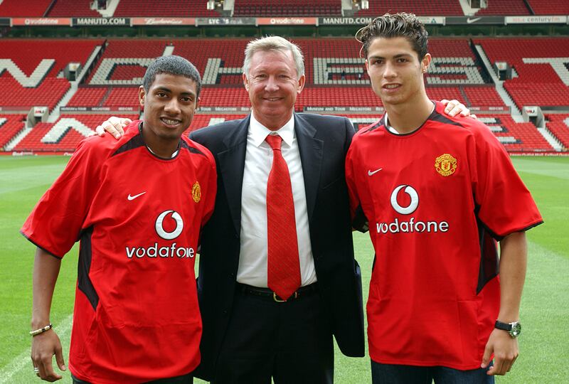 Sir Alex Ferguson poses with new signings Kleberson and Cristiano Ronaldo at Old Trafford in  2003. Getty Images