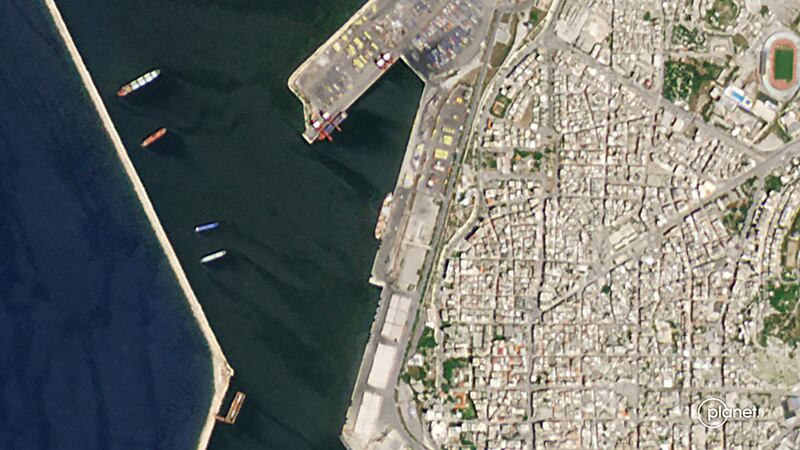 An aerial view shows a Russian vessel reportedly delivering stolen Ukrainian grain at Latakia port in Syria. AFP