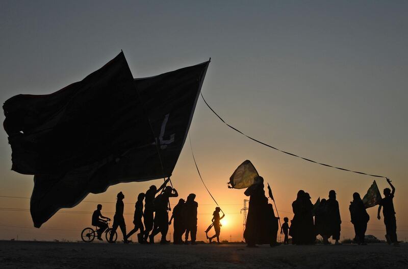 Iraqi Shiite Muslim pilgrims march from the southern city of Nasiriyah in Dhi Qar province, Iraq. AFP