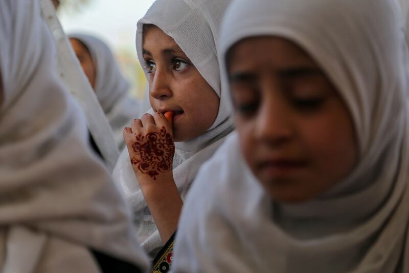 Afghan girls attend classes at an Islamic school in Kabul, Afghanistan. EPA