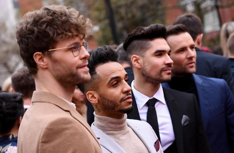 Jay McGuinness, Aston Merrygold, Louis Smith and Harry Judd arrive at the Olivier Awards at the Royal Albert Hall on April 7, 2019. AFP