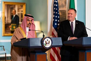  Secretary of State Mike Pompeo, right, listens to Saudi Minister of Foreign Affairs Prince Faisal bin Farhan Al Saud speak during their meeting at the State Department. AP Photo