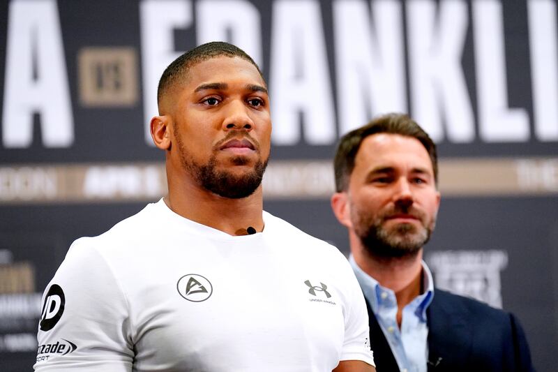 Anthony Joshua and promoter Eddie Hearn during a press conference at the Hilton London Syon Park. PA