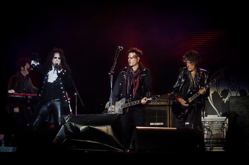 US musicians Alice Cooper, left, and Joe Perry, right, of the Hollywood Vampires perform with Johnny Depp during the Rock in Rio Lisboa festival at Parque da Bela Vista in Lisbon, Portugal, in 2016. EPA