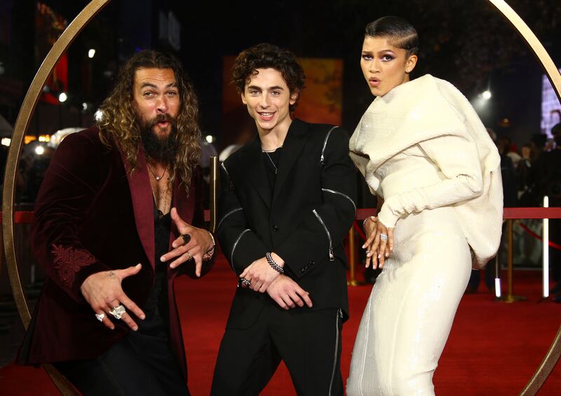 Jason Momoa, Timothee Chalamet, and Zendaya pose for photographers on arrival at the premiere of 'Dune' at Odeon Luxe Leicester Square in London. AP
