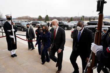 President Joe Biden and Vice President Kamala Harris walk with Joint Chiefs Chairman Gen Mark Milley and Secretary of Defense Lloyd Austin at the Pentagon in Washington. AP Photo