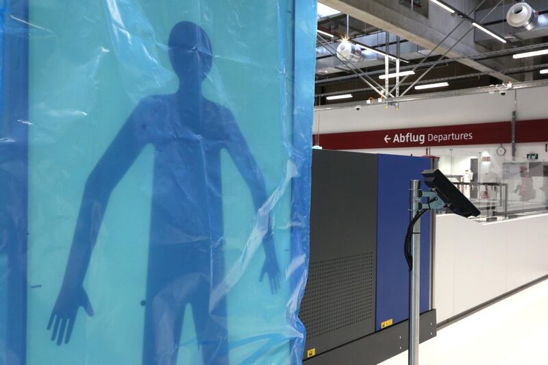 SCHÃ–NEFELD, GERMANY - SEPTEMBER 25: A brand-new, unused body scanner is seen in the security check area of Terminal 2 at Willy Brandt Berlin-Brandenburg Airport (BER) on September 25, 2020 in SchÃ¶nefeld, Germany. The airport's originally-scheduled opening in 2011, five years after building began in 2006, was delayed due to faulty construction planning, management issues, and corruption, and is now planned to occur on Oct. 31, 2020, when the site is intended to replace Berlin's Tegel (TXL) and SchÃ¶nefeld (SXF) airports.  (Photo by Adam Berry/Getty Images)