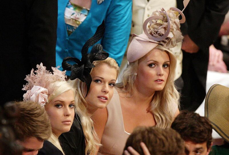 Earl Spencer's daughters, Lady Amelia, Lady Eliza and Lady Kitty wait for the wedding ceremony for Britain's Prince William and Kate Middleton to start inside Westminster Abbey in London on April 29, 2011