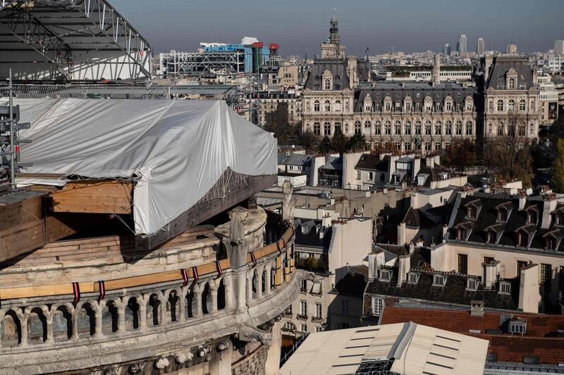 The roof of Notre-Dame cathedral with Paris city hall and the Beaubourg museum in the background. AFP