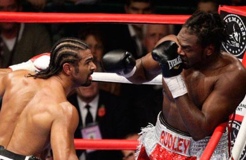 Audley Harrison covers up to avoid David Haye during their fight in 2010
