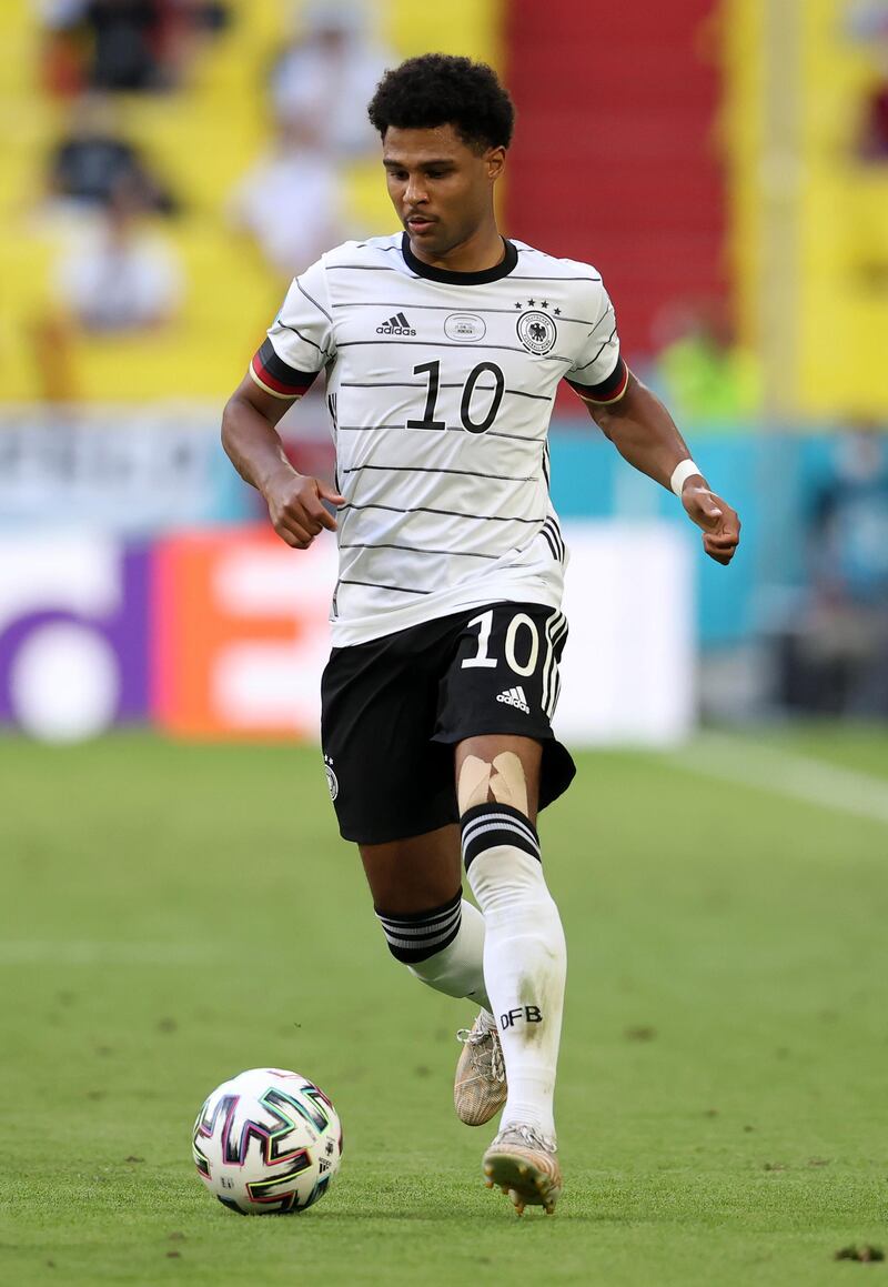 Serge Gnabry - 8: Has prolific scoring record for Germany but livewire attacker almost showed his assist skills with superb curling cross into box 25 minutes. Denied goal his performance deserved just before half-time when he skipped past Pepe but saw shot saved by Patrico. Getty