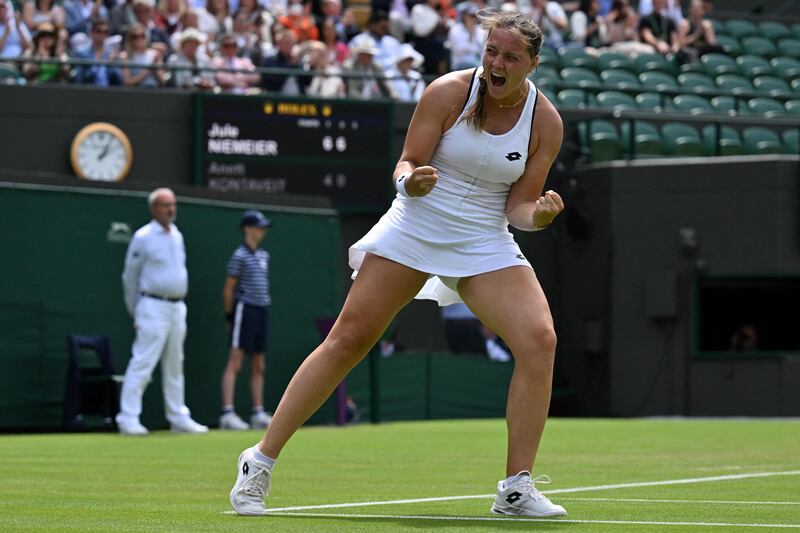 Jule Niemeier of Germany celebrates after beating Estonia's Anett Kontaveit 6-4, 6-0 in the second round of Wimbledon. AFP