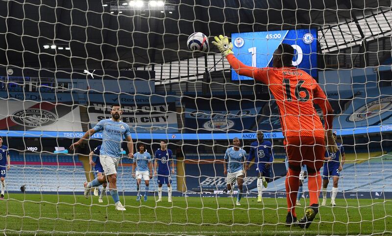 Chelsea goalkeeper Edouard Mendy saves Sergio Aguero's Panenka penalty attempt in the first half. AP