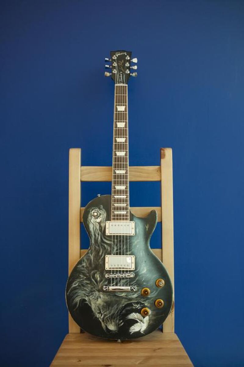 A Les Paul Gibson guitar decorated by artist Matthew Ryderh from the United Kingdom titled Lost Doves. Antonie Robertson / The National