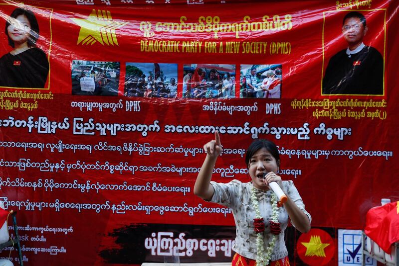 A candidate of Democracy Party for a New Society talks with microphone during an election campaign rally at downtown area in Yangon, Myanmar on Sunday. EPA