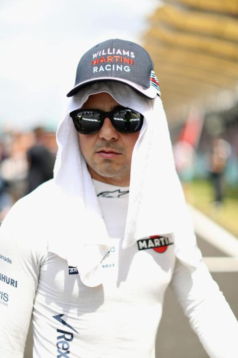 Felipe Massa of Brazil and Williams on the grid before the Malaysia Formula One Grand Prix at Sepang Circuit. Mark Thompson / Getty Images