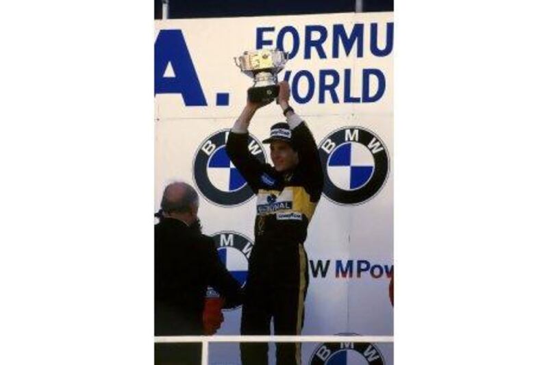 Ayrton Senna wins his first Grand Prix in 1985 at Estoril. Sutton Motorsport Images