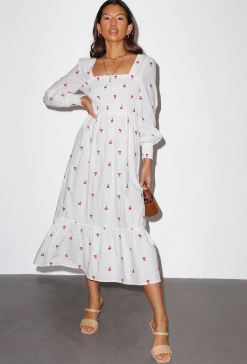 This long-sleeve cherry-print dress works perfectly with heels or flats, and can be dressed up for dinners; Dh520, Never Fully Dressed. Photo: Never Fully Dressed