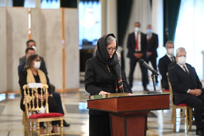 Prime Minister Najla Bouden takes the oath during the country's new government swearing-in ceremony, in Tunis, Tunisia October 11, 2021.  Tunisian Presidency/Handout via REUTERS ATTENTION EDITORS - THIS IMAGE WAS PROVIDED BY A THIRD PARTY    NO RESALES.  NO ARCHIVES. 