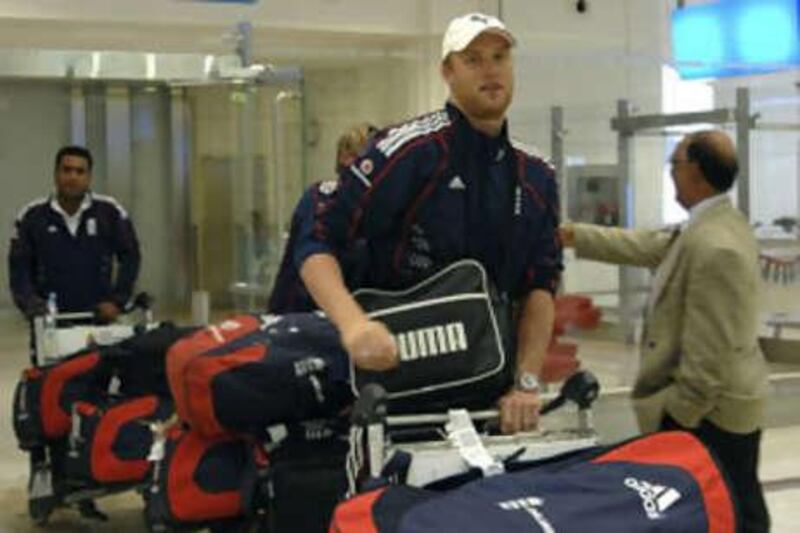 Andrew Flintoff arrives with his teammates at Dubai airport.