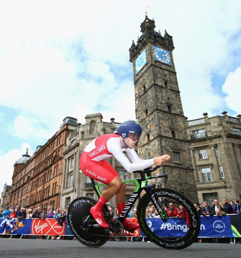 Alex Dowsett of England goes past the Tolbooth during the men's individual time trial during the Glasgow 2014 Commonwealth Games on July 31, 2014. Richard Heathcote/Getty Images