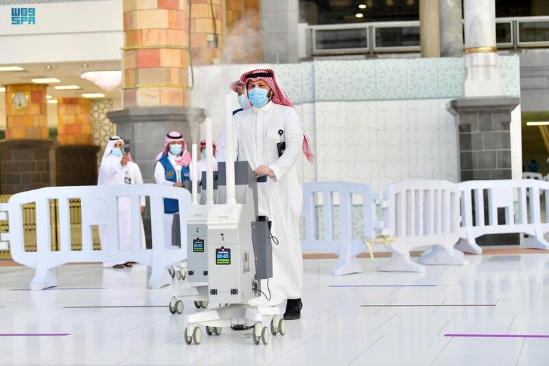 Ministry of Hajj and Umrah officials sanitise floors at the Grand Mosque in Makkah, Saudi Arabia, in preparation for the arrival of pilgrims.