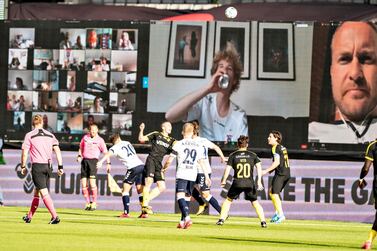 Soccer Football - 3F Super League - AGF Aarhus v Randers - Ceres Park, Aarhus, Denmark - May 28, 2020. Spectators watch the action via Zoom during the first match after the novel coronavirus shutdown. Ritzau Scanpix/Henning Bagger via REUTERS ATTENTION EDITORS - THIS IMAGE HAS BEEN SUPPLIED BY A THIRD PARTY. DENMARK OUT. NO COMMERCIAL OR EDITORIAL SALES IN DENMARK