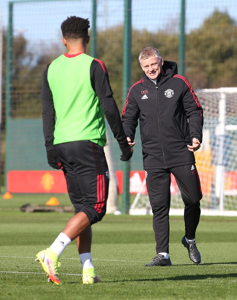 Manager Ole Gunnar Solskjaer oversees Manchester United's training session.