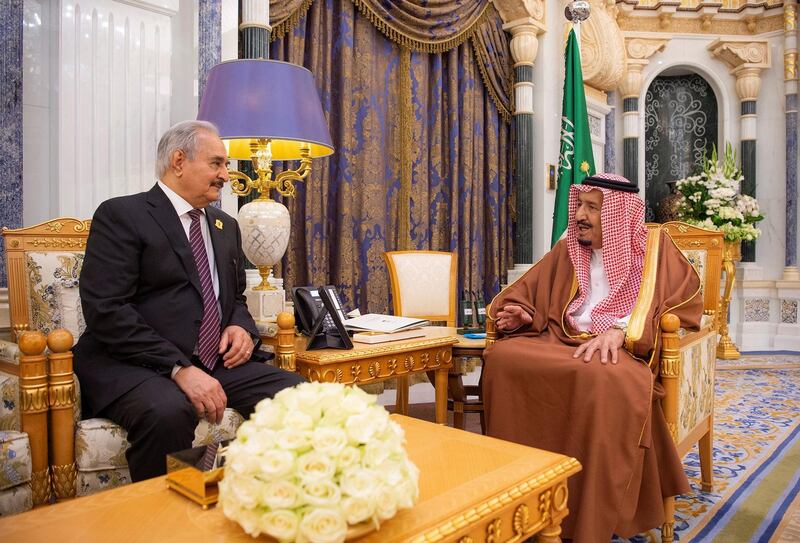 Saudi Arabia's King Salman bin Abdulaziz meets with Libyan military commander Khalifa Haftar in Riyadh, Saudi Arabia March 27, 2019. Bandar Algaloud/Courtesy of Saudi Royal Court/Handout via REUTERS ATTENTION EDITORS - THIS PICTURE WAS PROVIDED BY A THIRD PARTY.