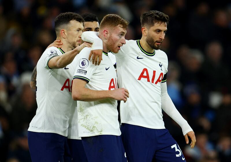 Tottenham's Dejan Kulusevski celebrates scoring their first goal with Ivan Perisic and Rodrigo Bentancur. Reuters