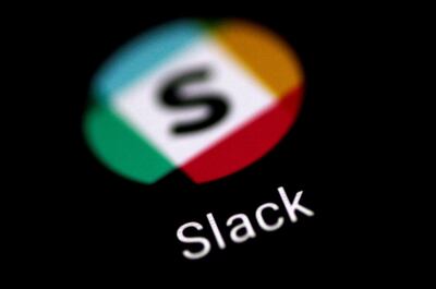 FILE PHOTO: The Slack messaging application is seen on a phone screen August 3, 2017.   REUTERS/Thomas White/File Photo