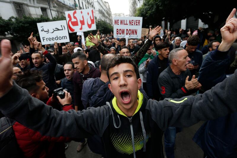 Algerian demonstrators take to the streets in the capital Algiers to reject the presidential election.  AP