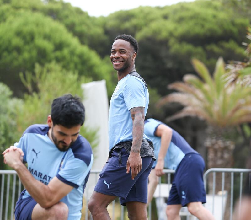 LISBON, PORTUGAL - AUGUST 11: Raheem Sterling of Manchester City takes part in a stretching session in the build up to the UEFA Champions League Quarter Final match at the team hotel on August 11, 2020 in Lisbon, Portugal. (Photo by Victoria Haydn/Manchester City FC via Getty Images)