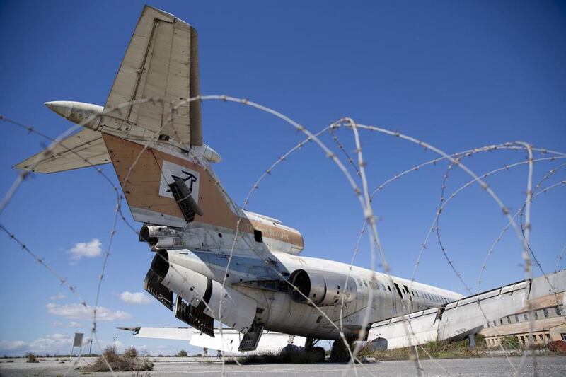 A Cyprus Airways passenger jet stands in the abandoned Nicosia International Airport.