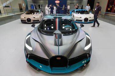 DUBAI, UNITED ARAB EMIRATES. 12 November 2019. Bugatti at the Dubai Motor Show opening day. (Photo: Antonie Robertson/The National) Journalist: Nic Webster. Section: National.