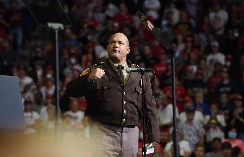 Tulsa County Sheriff Vic Regalado speaks before US President Donald Trump arrives. EPA